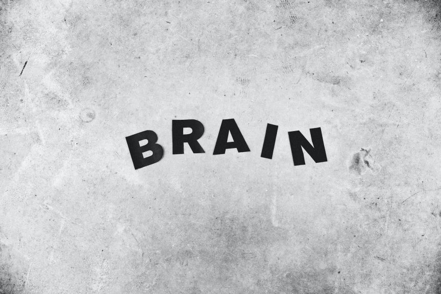 Background of Brain inscription on rugged wall