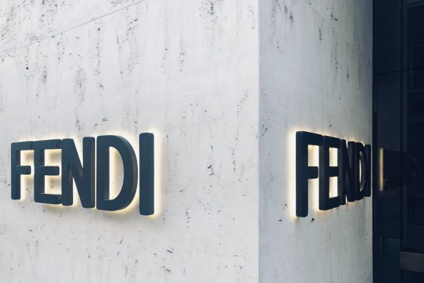 a building that has a sign that says fendi on it