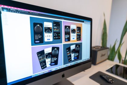 silver imac on white table