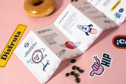 a donut sitting on top of a pink table